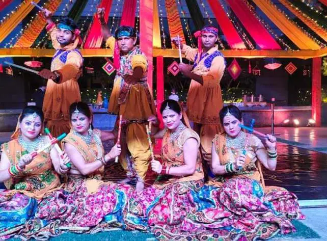 Folk dance troupe performing at a wedding